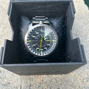 Men’s silver and metal watch